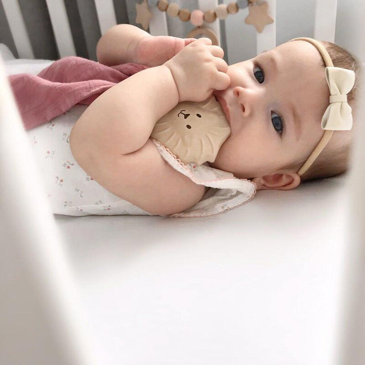 Tikiri Rubber Lion Teether with Dusty Pink Organic Muslin Comforter